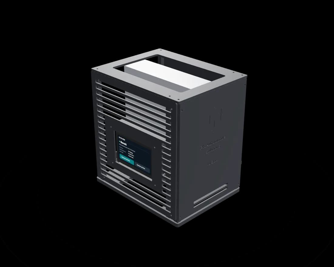 The PK KI-Box: a black enclosure with ventilation slots, a status display on the left side and the PK logo embossed on the front.